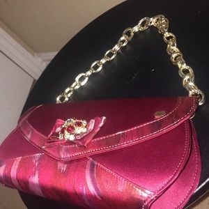 Wine colored heeled shoe and purse